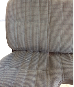 Clean and fix rip on side of seat.