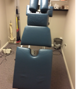 Repair chiropractic table that had several rips and tears and re-color the material.