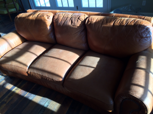 Leather sofa and love seat just repaired and reconditioned