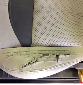 Automotive seat in need of repair