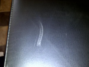 Leather ottoman scuff repair