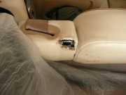 Both rear of back seats torn from convertible top rubbing.