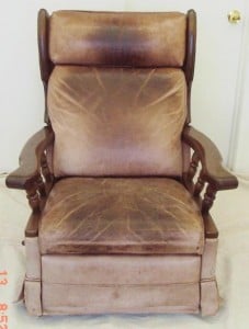 Leather chair darkened from body oil