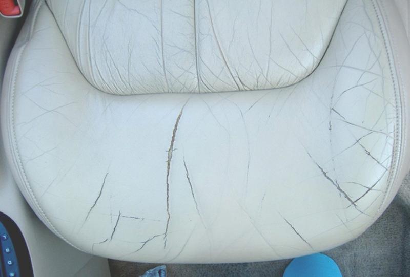 Seat worn, over time, from dirt and oil