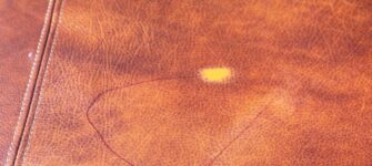 Don’t use finger nail polish remover to remove marks on leather upholstery