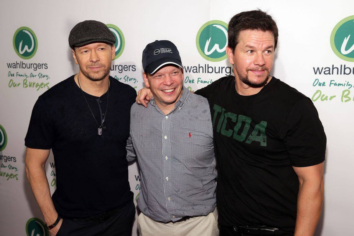 the wahlberg bros understandably grinning after founding wahlburgers